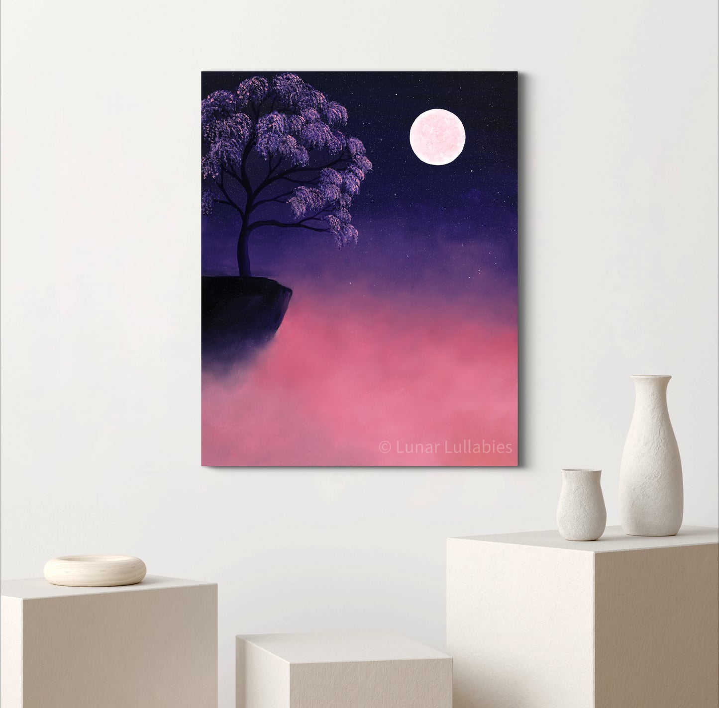 Mockup: Artwork of a purple tree under a moonlit sky on a white wall with decorative vases below.