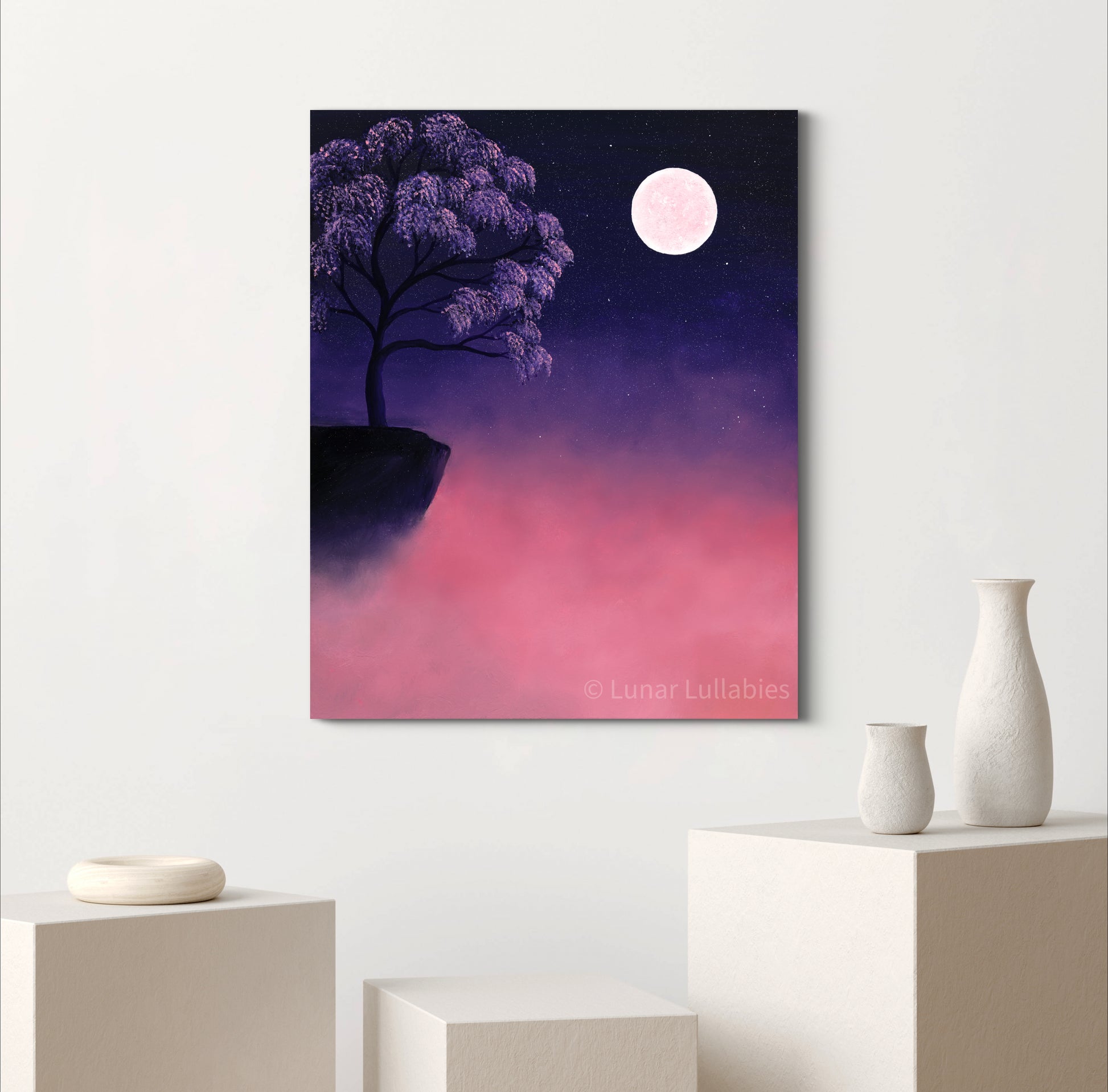 Mockup: Artwork of a purple tree under a moonlit sky on a white wall with decorative vases below.