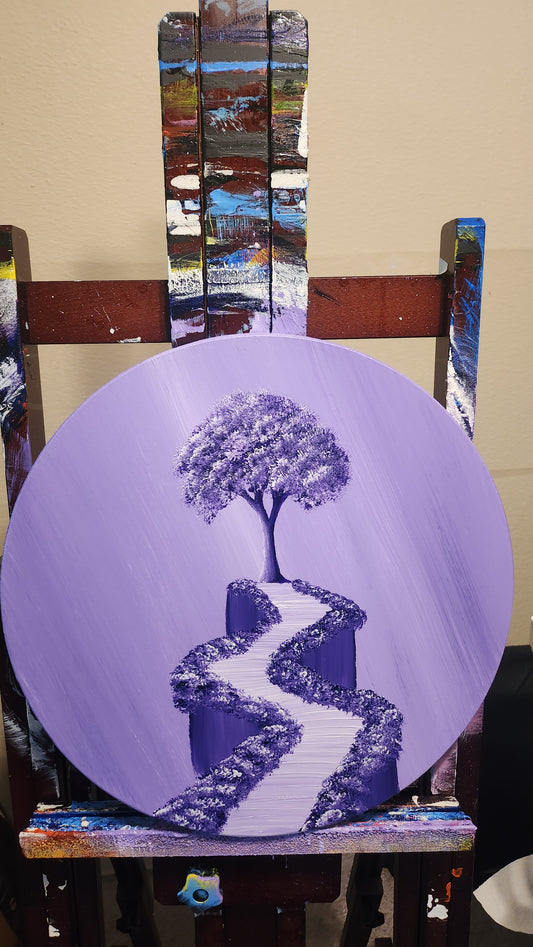 Lavender Dreams Original Painting: Painting on a wood circle panel on an easel of a purple sky and a purple tree and path
