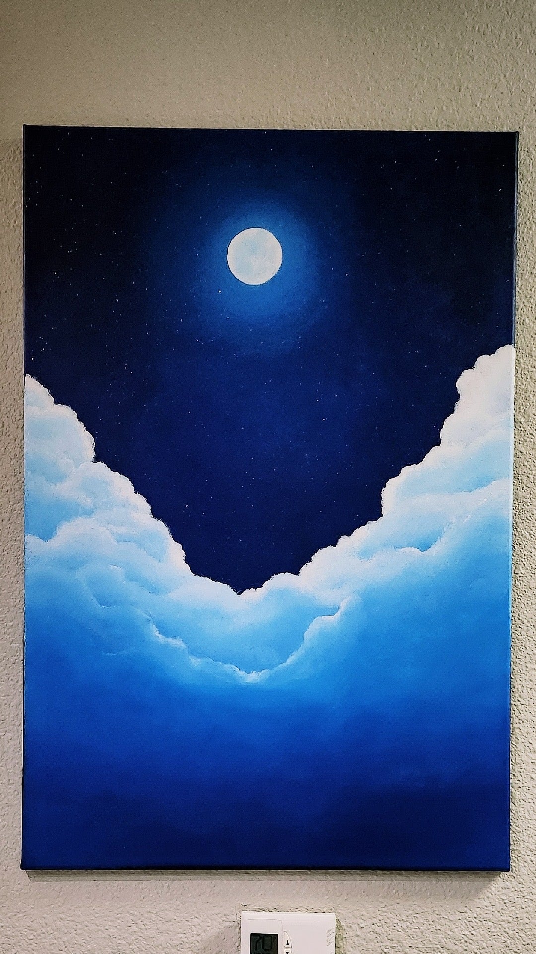 Moon Rise Original Painting: Painting of a night sky with a full moon and clouds on a wall.