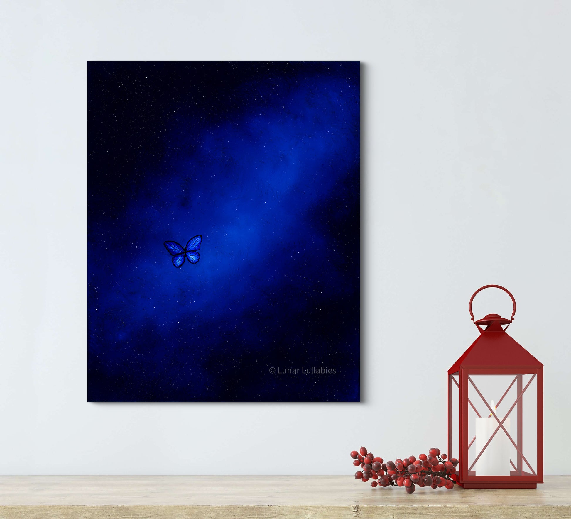 Mockup: Blue butterfly painting on a white wall with a red lantern and branches below.