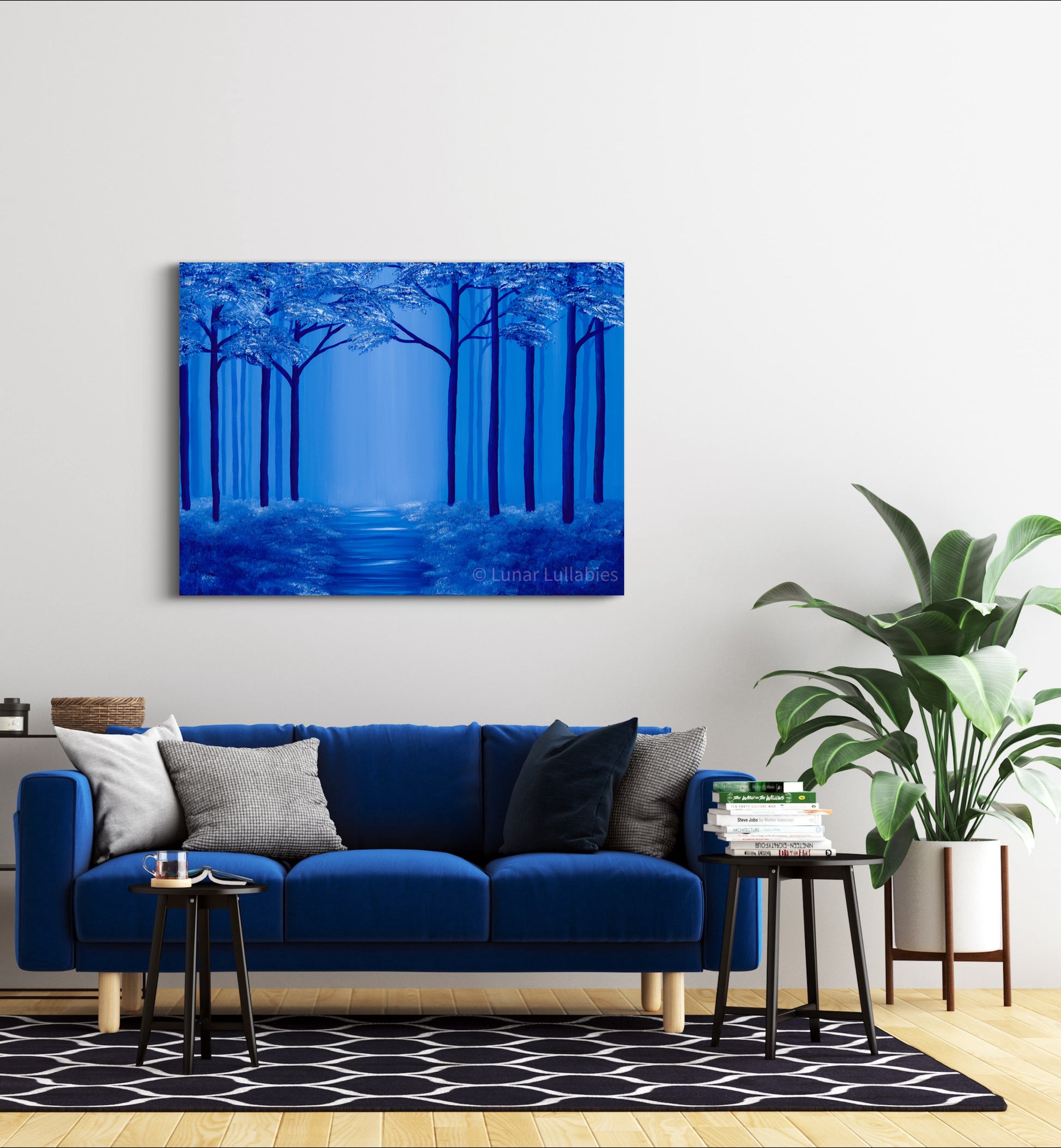 Mockup: Blue forest painting above a blue sofa in a living room
