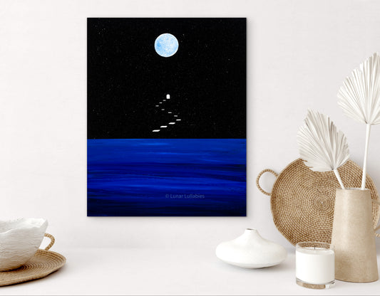 Mockup: Artwork of a white door and steps with a moon and stars on a black background, displayed on a white wall with decorative items.