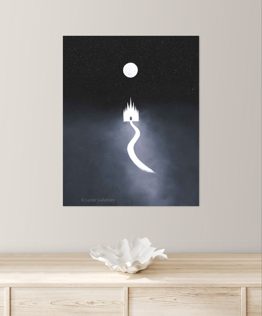 Artwork of a white castle silhouette on a dark background, displayed on a wall above a wooden cabinet.