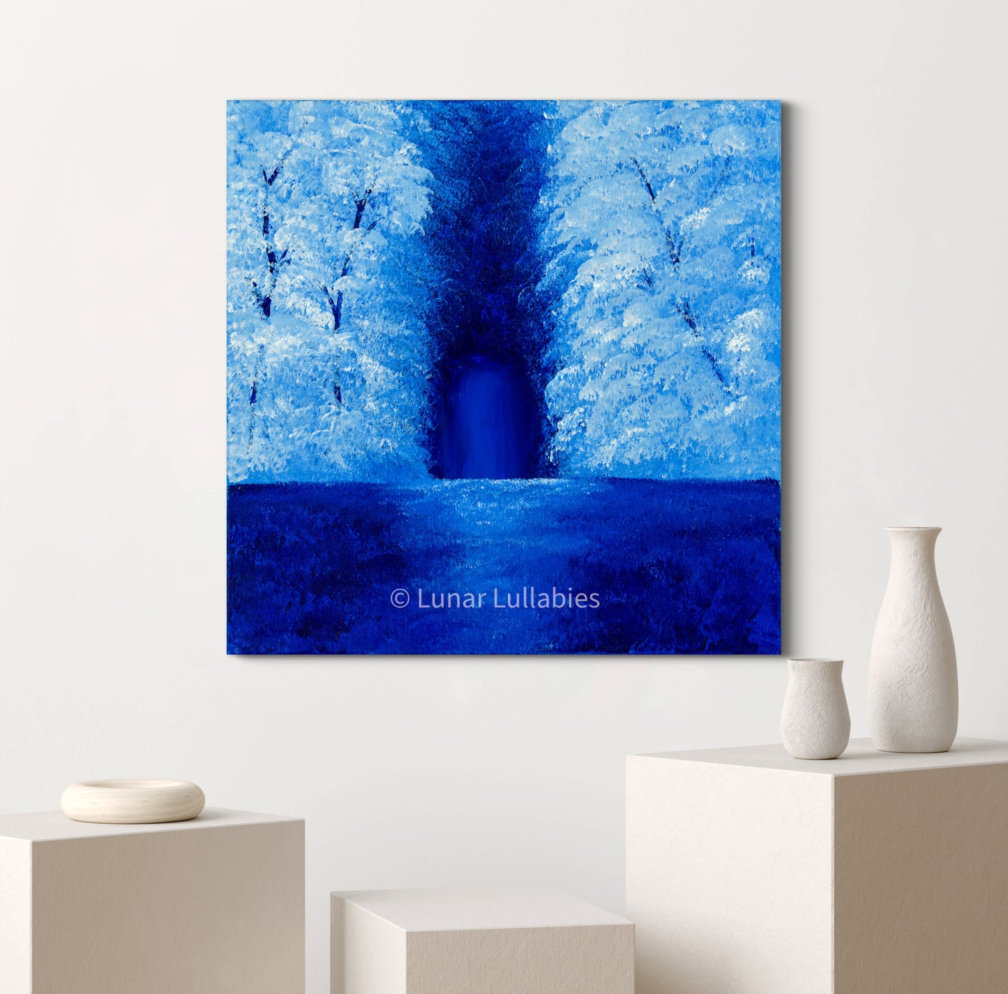 Mockup: Artwork of a blue forest scene on a white wall with decorative vases below.